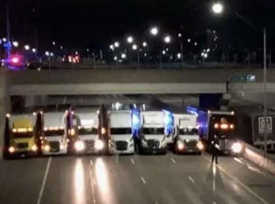 13 Truck Drivers Turn Heads After Blocking Highway To Form ‘Safety Net’